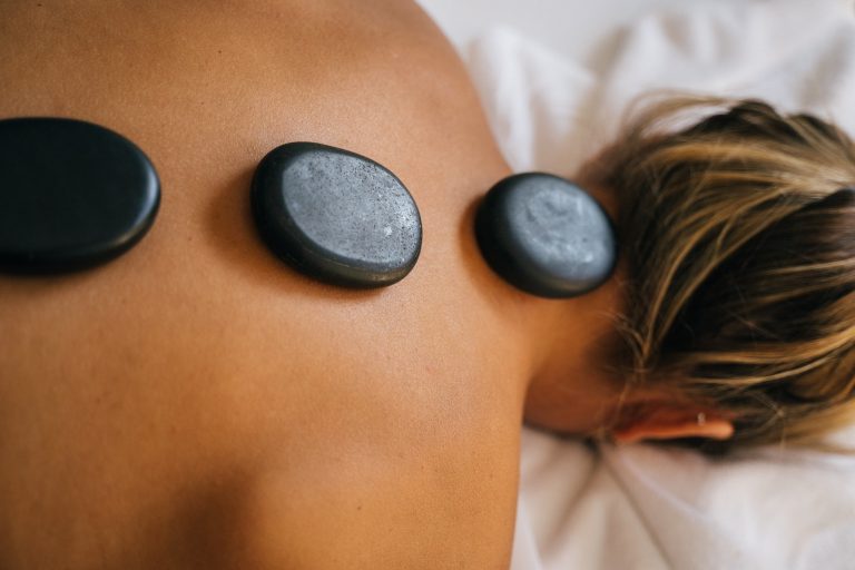 Pebbles on a Person's Bare Back